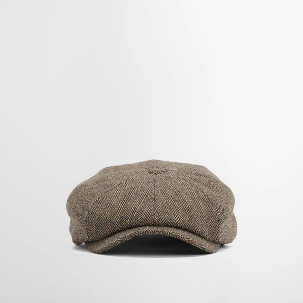 Brown cap on a light gray background