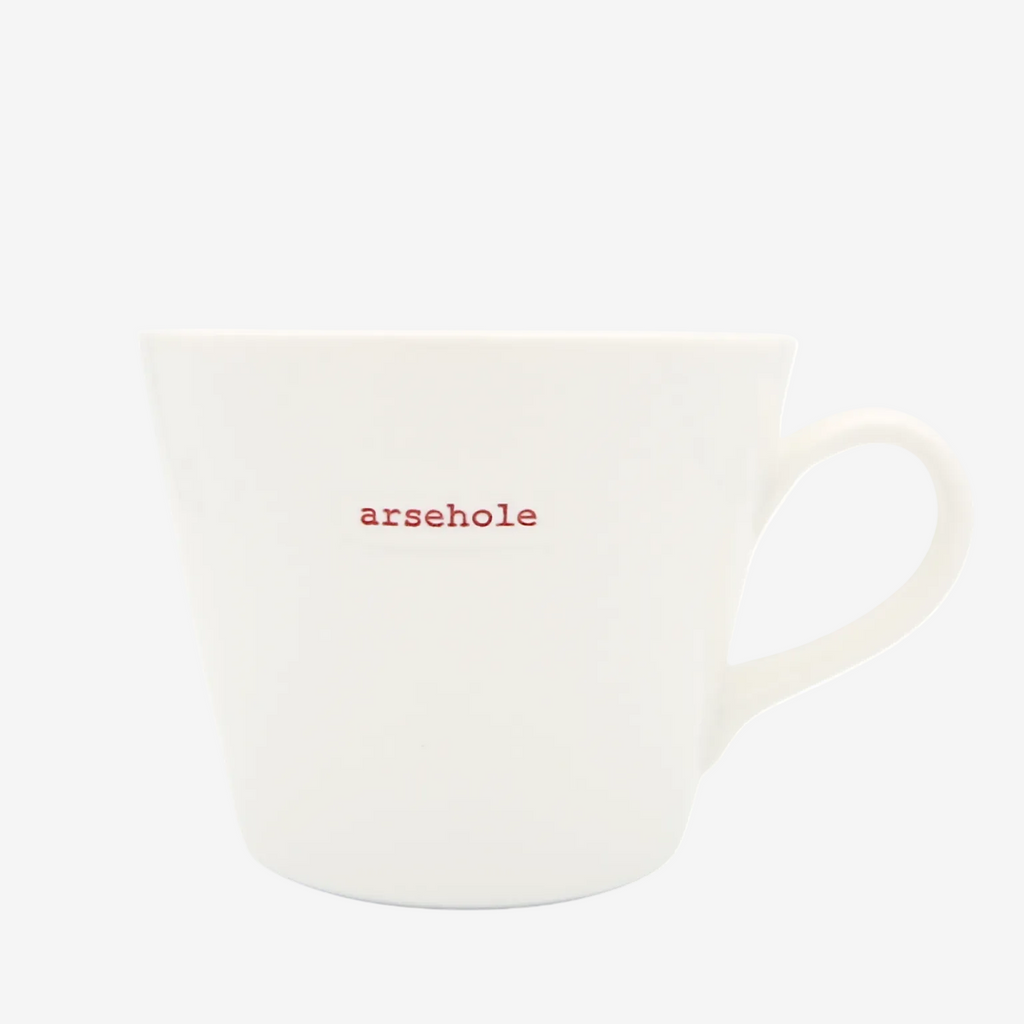 White mug with the word 'arsehole' printed on it against a white background