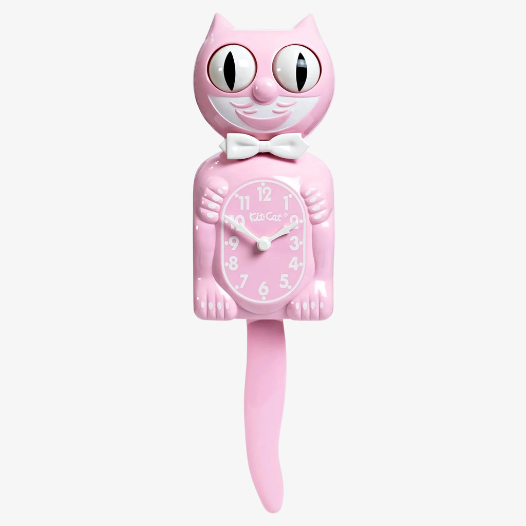 Pink cat-shaped clock with a long tail on a white background